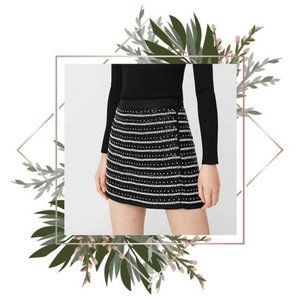 MANGO | Black beaded mini skirt.